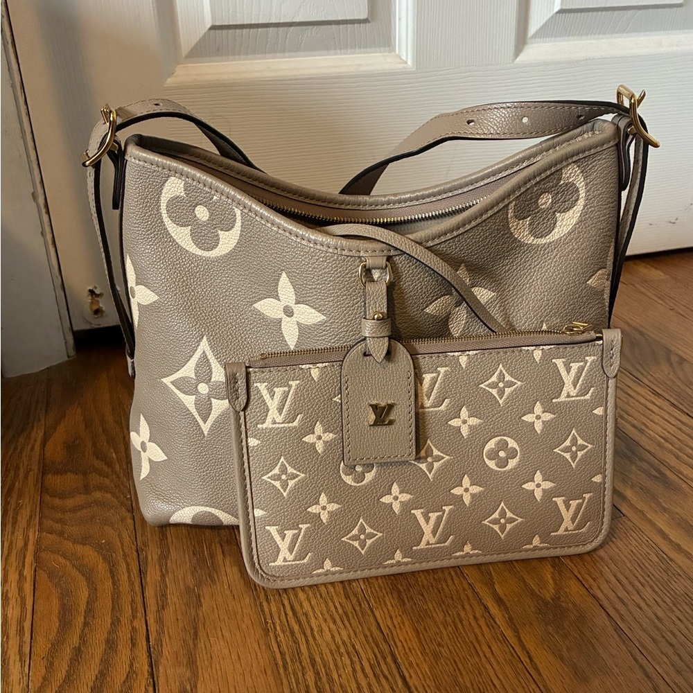Louis Vuitton CarryAll PM Dove and Cream. Lightly used in good condition.
